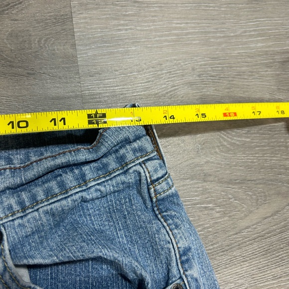 Levi's 515 Bootcut Jeans in a light-wash blue denim finish. Misses 4 short - Picture 6 of 7